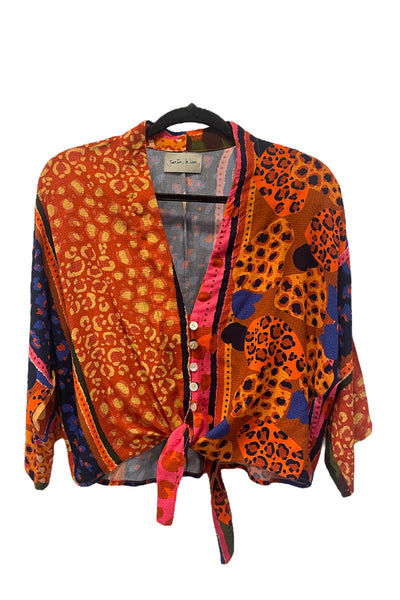 Blusa Mila animal print coral